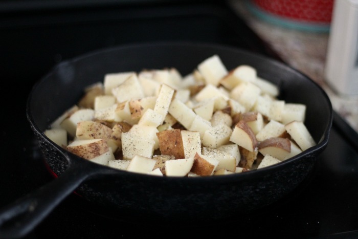 This recipe for garlic and herb pork loin with Parmesan Fried Potatoes is THE perfect recipe for your summer grilling