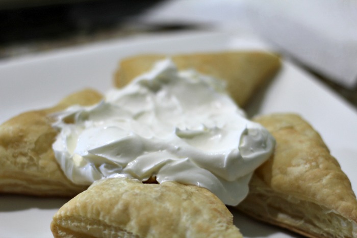 cream cheese piled on top of puff pastry