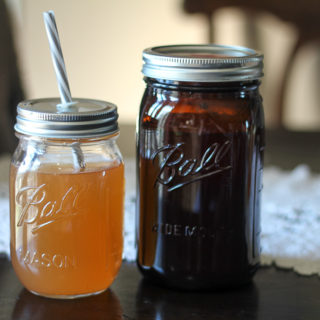 Crockpot apple cider in Ball Amber Canning Jars