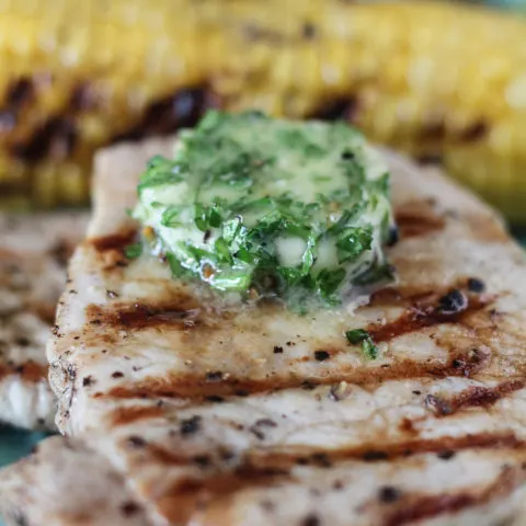 Grilled Pork Chops with Garlic Herb Butter