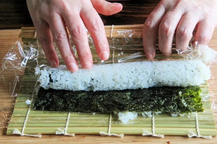 Making sushi at home -- sushi roller