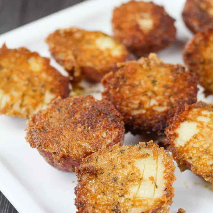 Replying to @Dan-O's Seasoning Parmesan crusted potatoes make a perfe, parmesan crusted potatoes